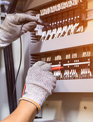 KA Talarico Electric LLC electrician working on power lines on About Us page.